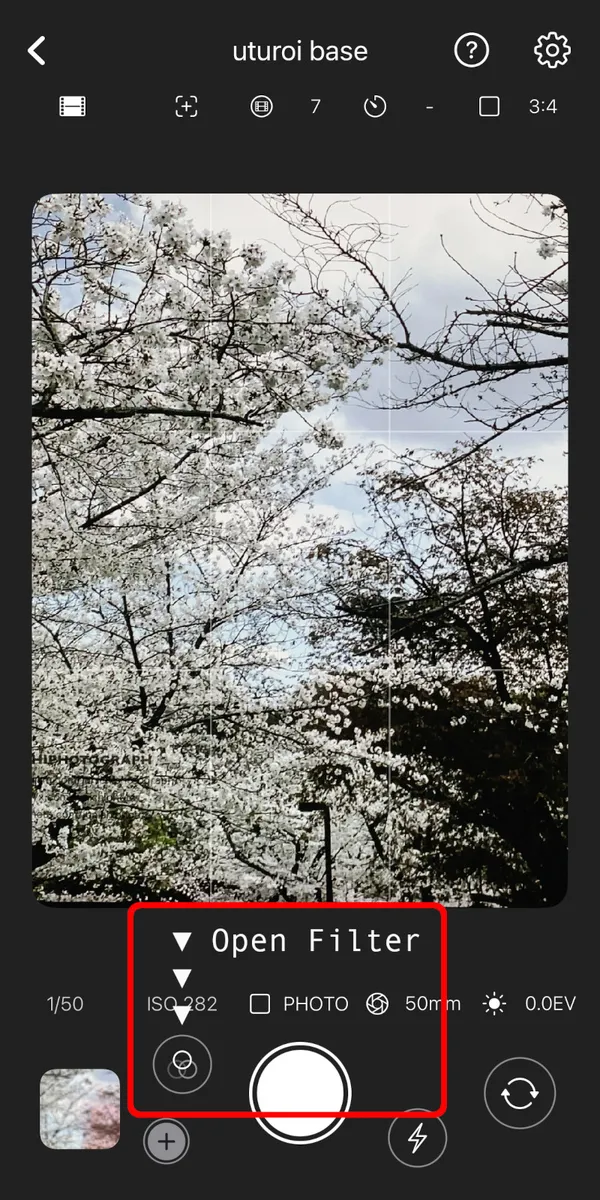 Tapping the filter button located to the left of the shutter button.